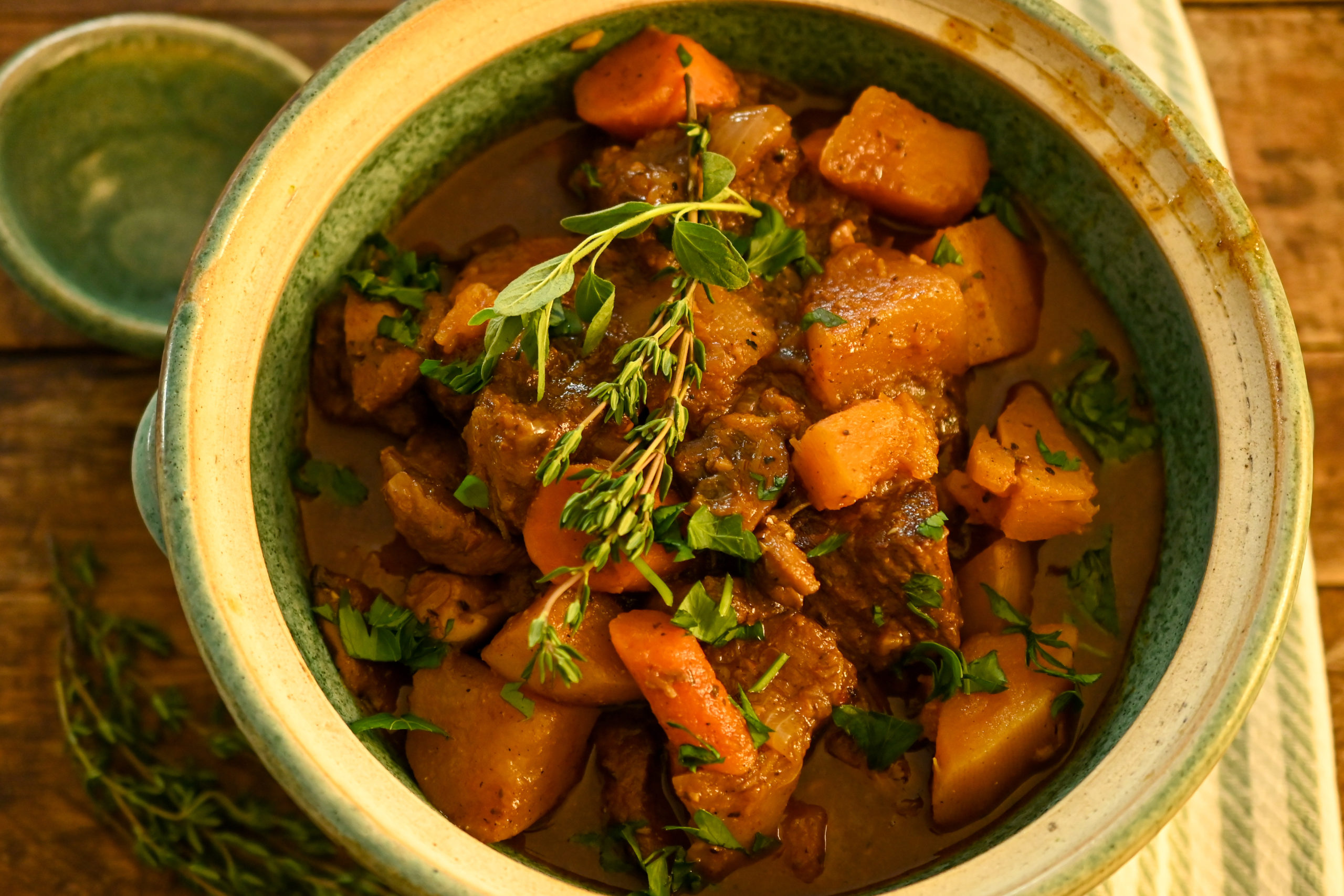 keto beef stew in teal ceramic pot