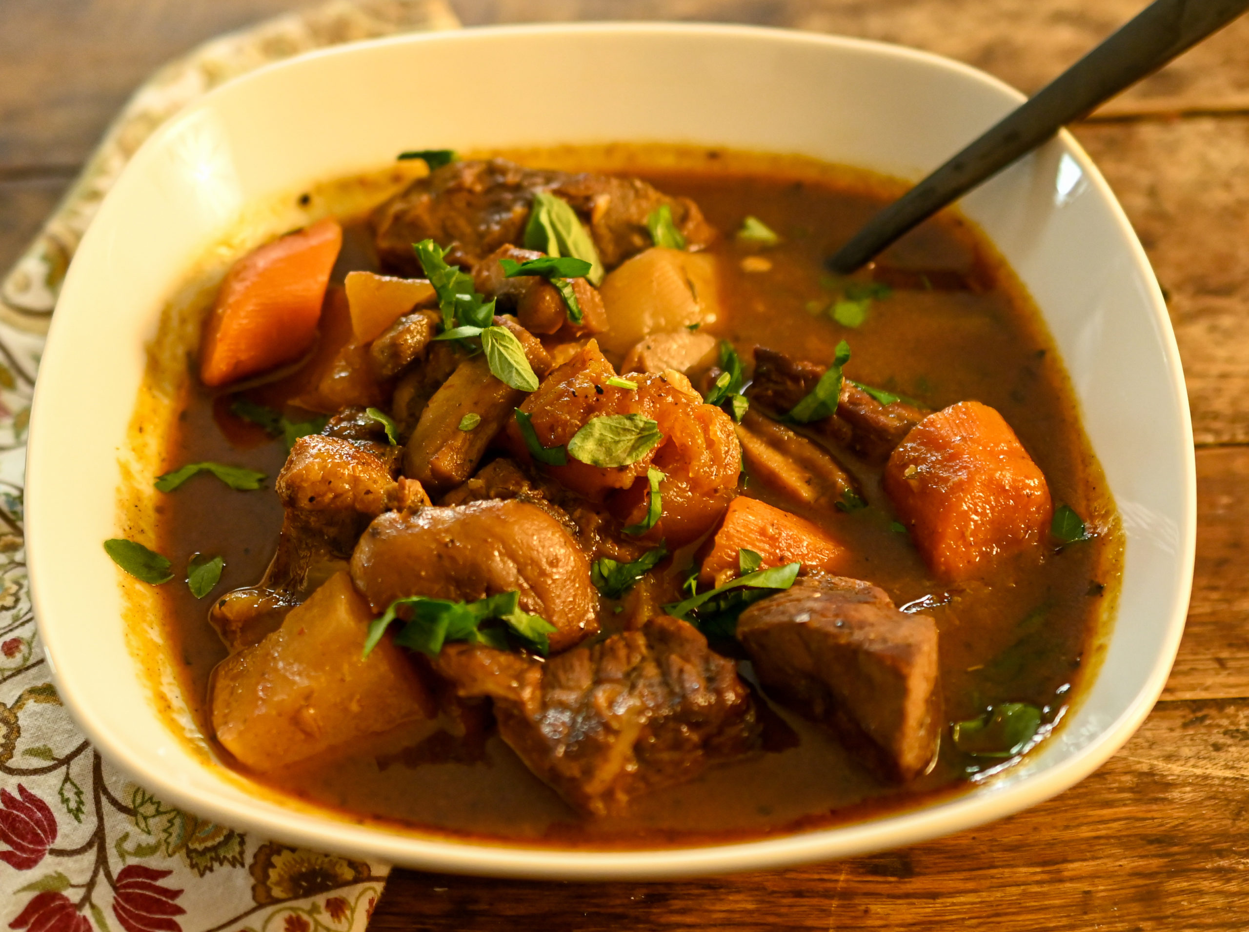 keto beef stew served in a white bowl