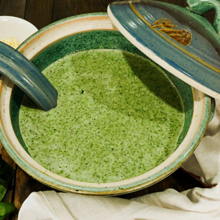 keto cream of spinach soup served in a teal soup tureen featured image