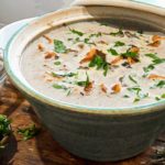 keto mushroom soup in a teal soup tureen ready to serve