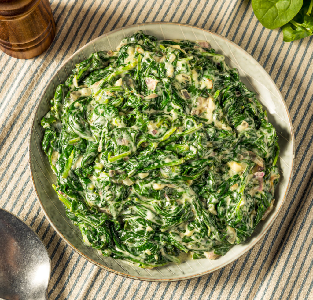 Keto Creamed Spinach served in a white bowl