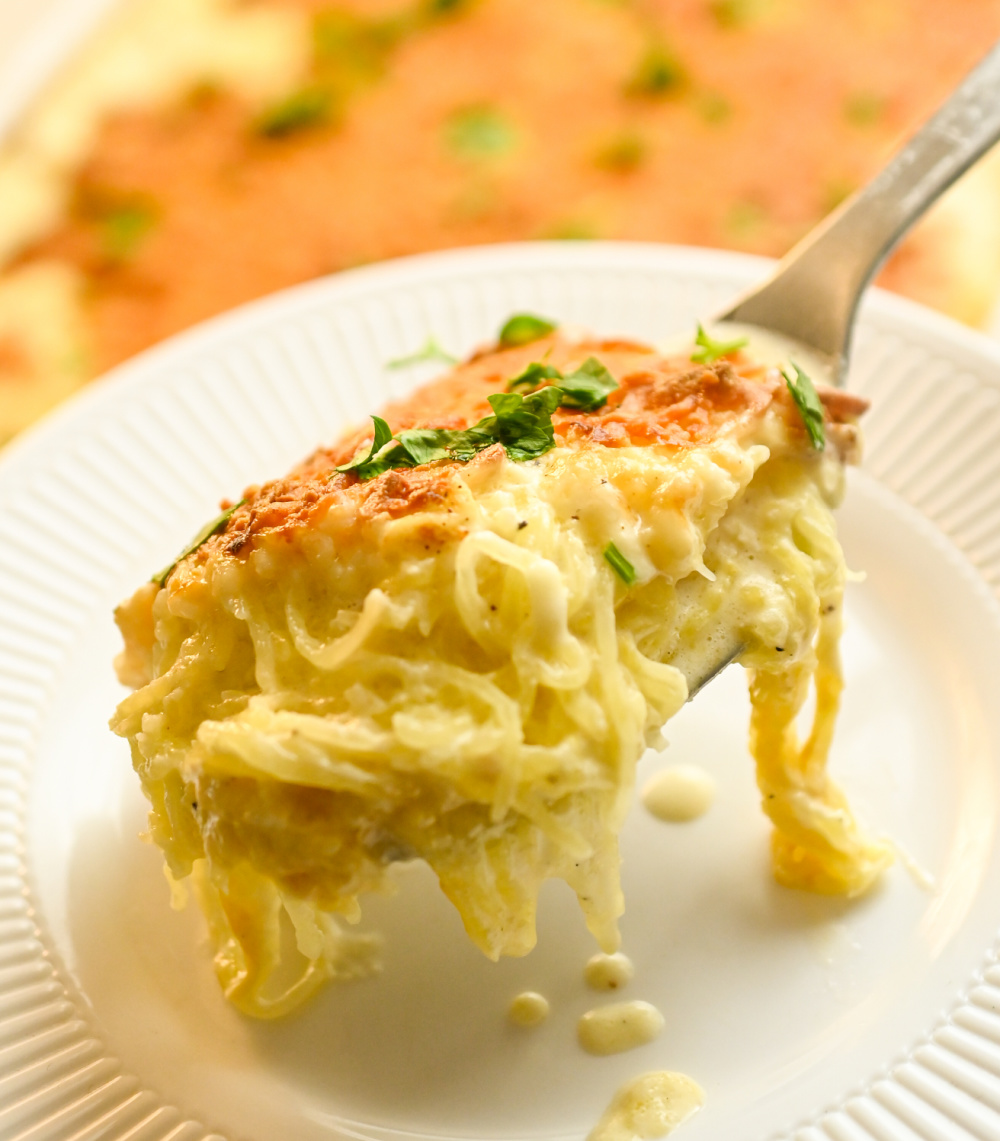 forkful of keto spaghetti squash Alfredo casserole