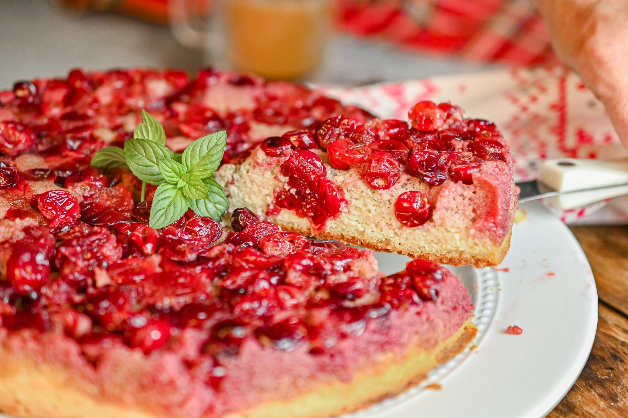 keto cranberry upside down cake fslice being served
