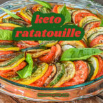 keto ratatouille in clear baking dish topped with fresh basil