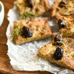 keto focaccia bread on top of crumbled parchment paper
