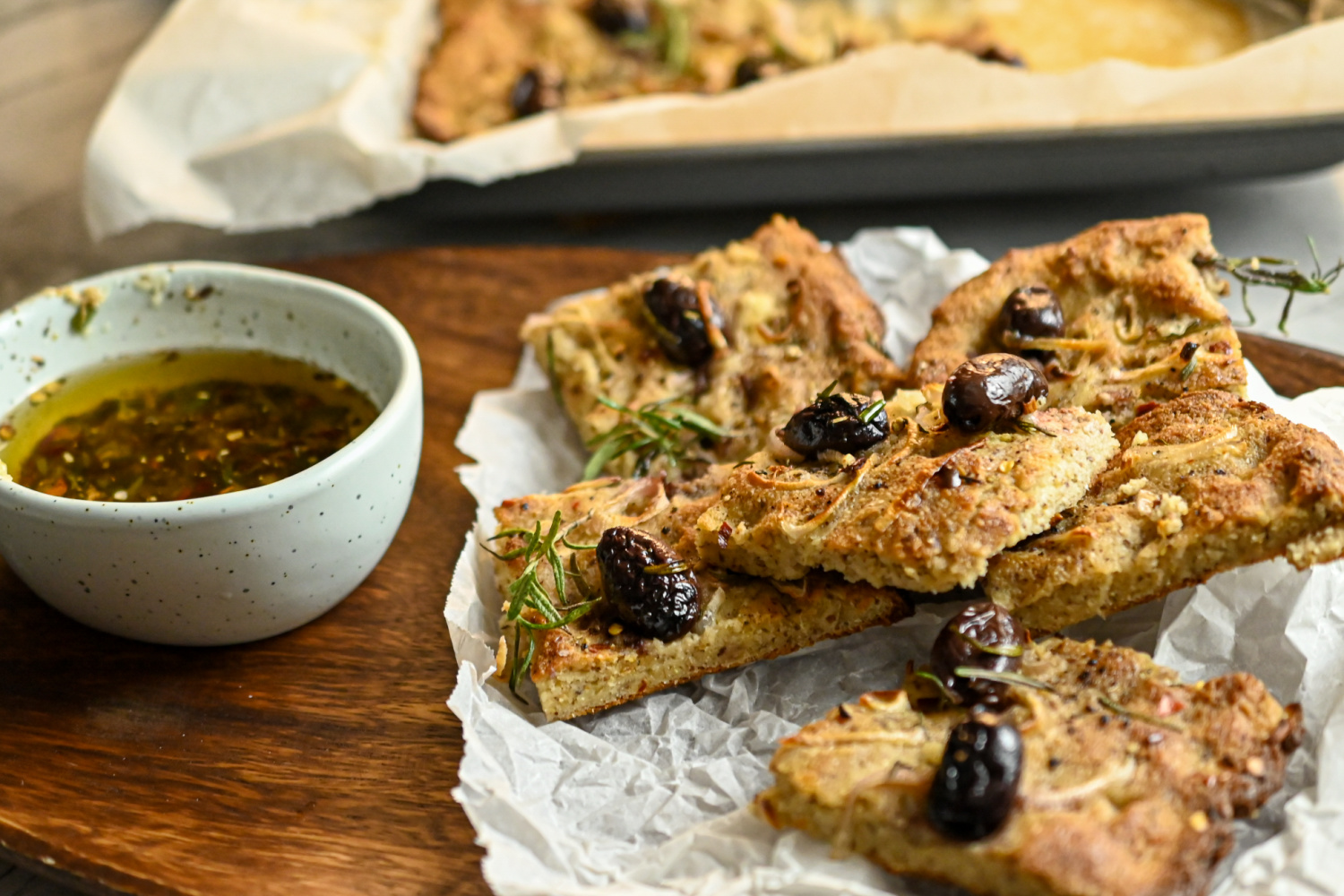 keto focaccia olive bread served on a wooden board