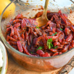 keto sumac caramelized onions in a clear container