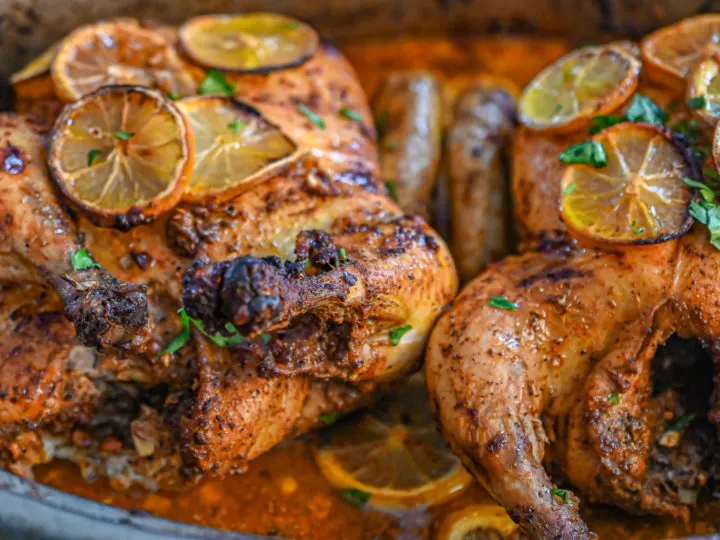 two keto sumac harissa chicken roasted in a large pan