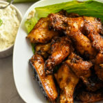 keto baked chipotle sweet and spicy wings served with blue cheese dipping sauce