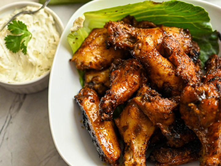 keto baked chipotle sweet and spicy wings served with blue cheese dipping sauce