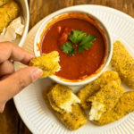 keto baked mozzarella cheese sticks served