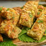 keto garlic bread on wood board close up