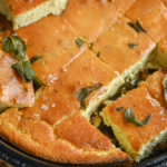keto brown butter sage cornbread sliced in cast iron