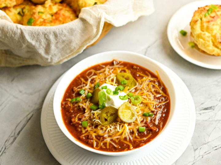 keto coconut cornbread muffins served with a bowl of keto chili