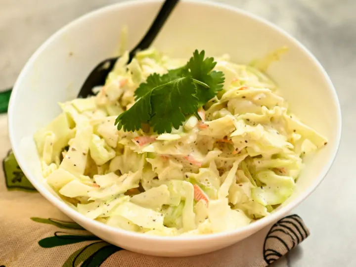 Best keto coleslaw served in a small white bowl