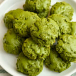 close up image of keto matcha cookies on a white plate