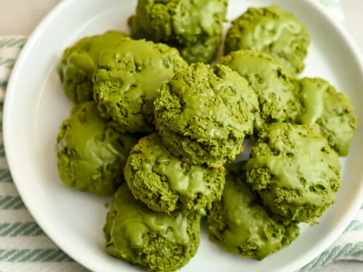 close up image of keto matcha cookies on a white plate