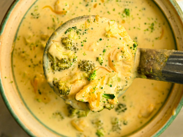 close up image of a keto broccoli chicken soup ladled