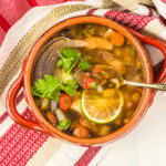 keto Southwest Chicken Soup in a red earthenware dish