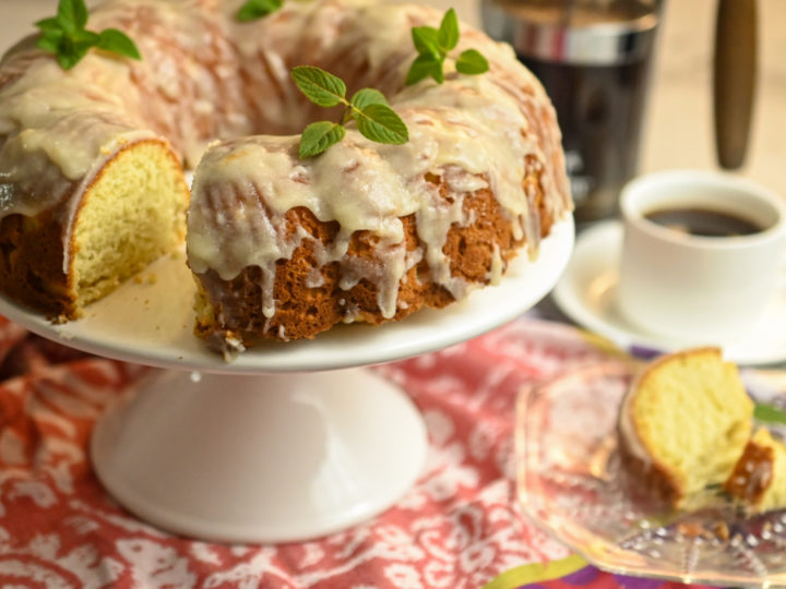 keto butter cake on a white cake stand