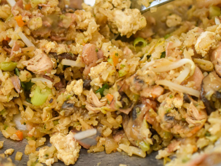 keto chicken fried rice in a stainless steel wok