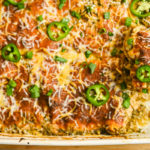 keto-green-enchiladas-baked-in-a-white-rectangle-baking-dish