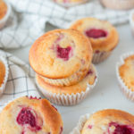 keto coconut flour raspberry muffins on marble counter