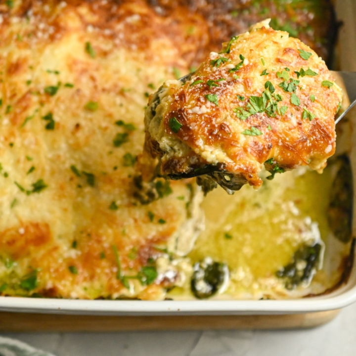 keto creamy spinach chicken casserole being served