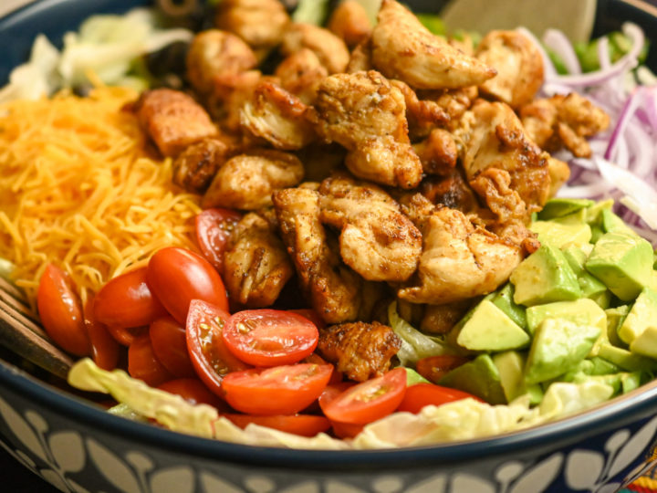 keto chicken taco salad served in a blue and white salad bowl