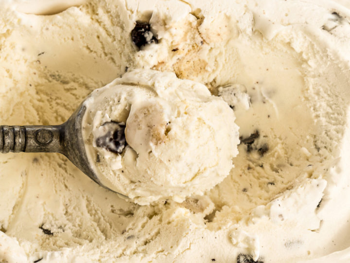 keto chocolate chip ice cream being scooped from the ice cream maker