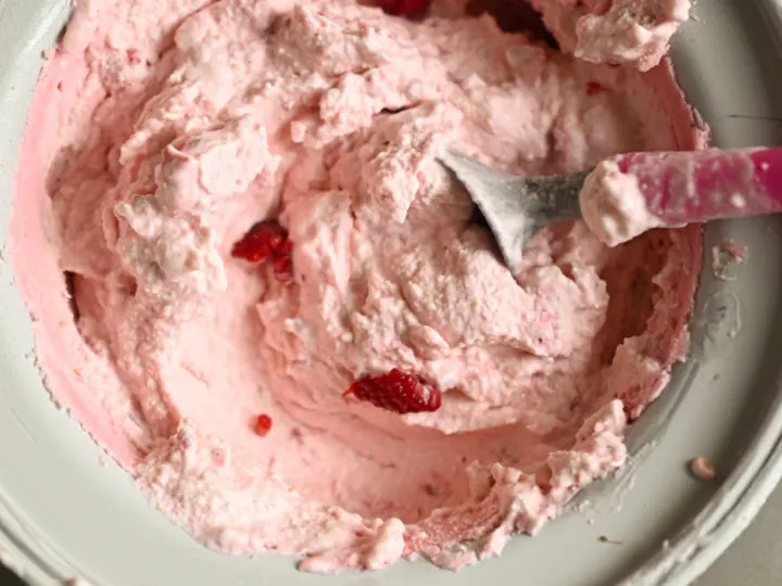 keto raspberry ice cream made in an ice cream maker