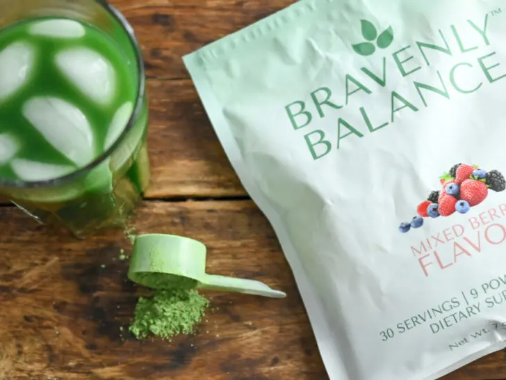 Bravenly Balance green dietary supplement mixed in water