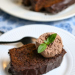 Keto cream cheese chocolate pound cake served with a scoop of keto chocolate ice cream