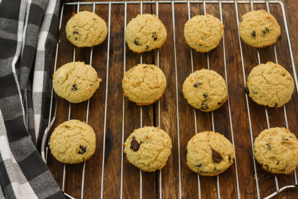 keto cream cheese chocolate chip cookies on a baking rack