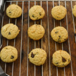 keto cream cheese chocolate chip cookies on a baking rack