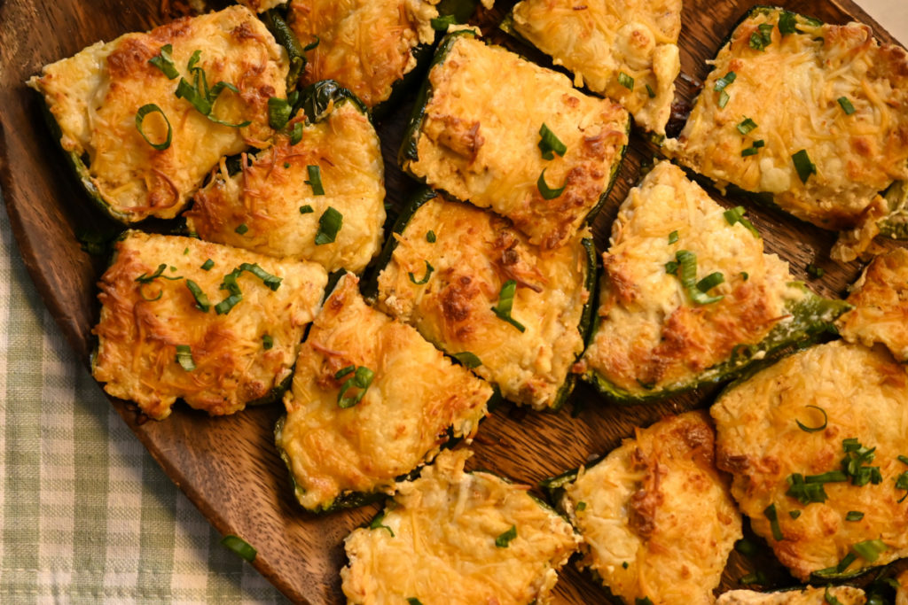 bite-size pieces of three cheese stuffed poblano peppers served as an appetizer.