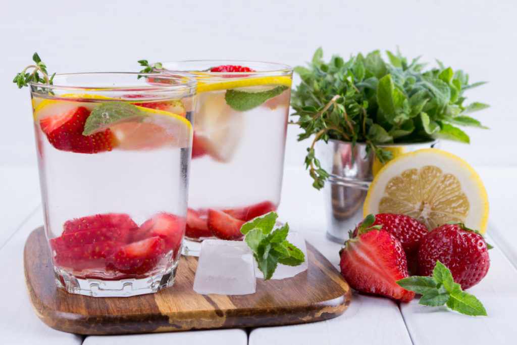 naturally flavored water with strawberries and lemons