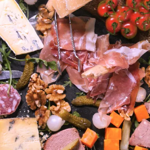 keto charcuterie board on black slate