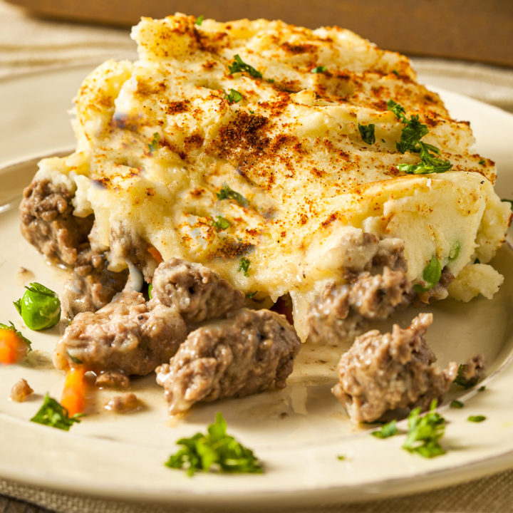 Keto shepherd's pie served on a beige plate