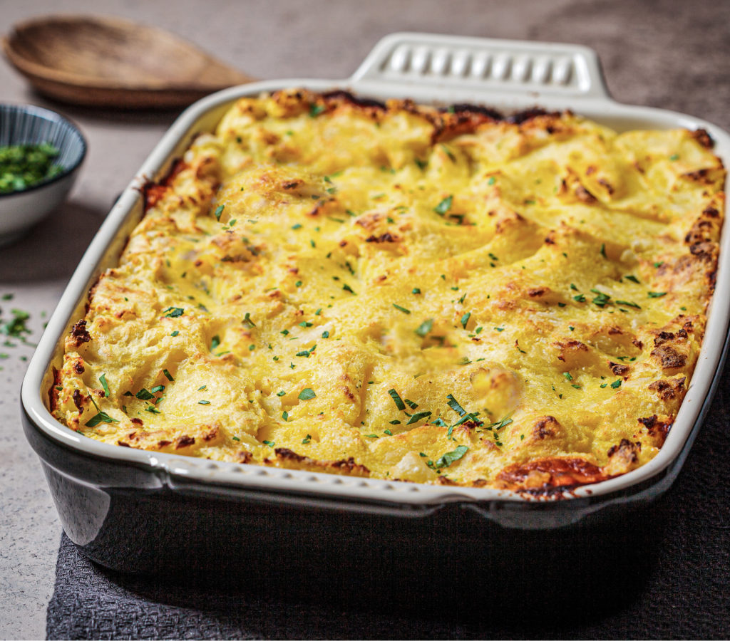 Low carb shepherd's pie baked in a white and black baking dish