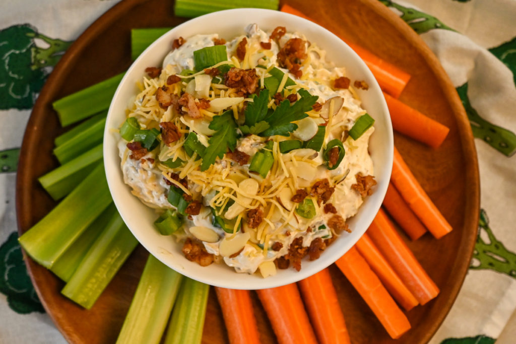 Keto Millionaire Dip served with raw carrots and celery sticks