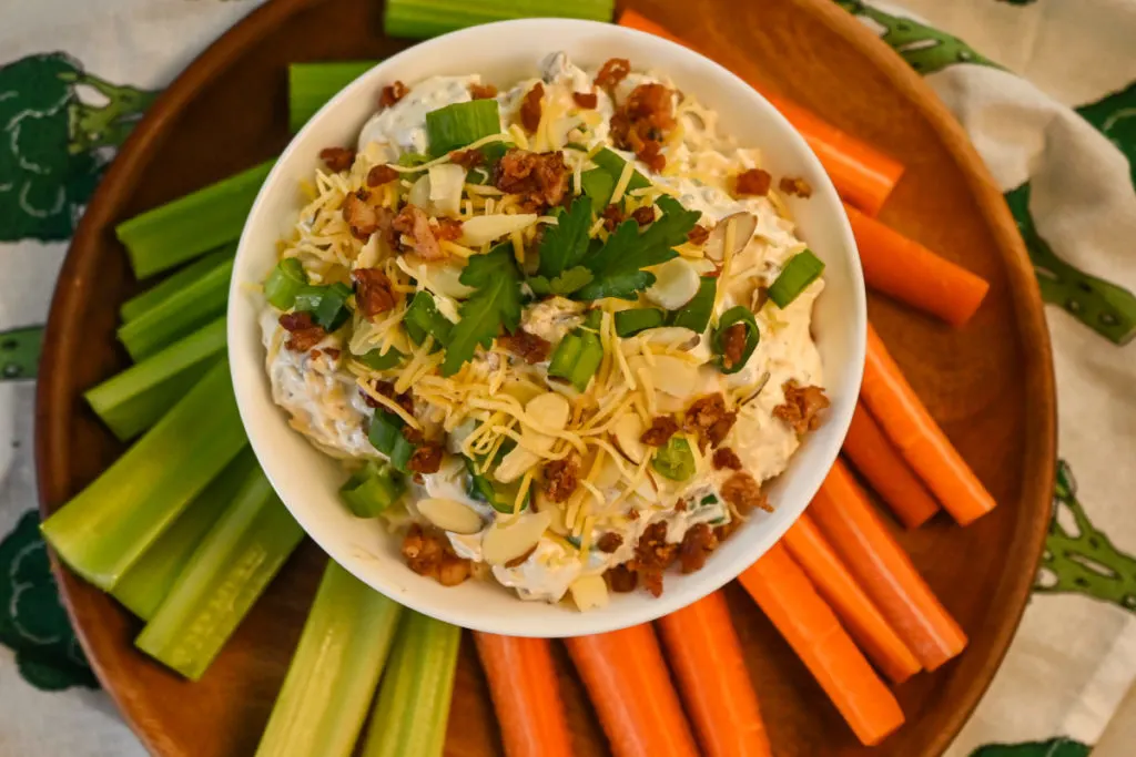 Keto Millionaire Dip served with raw carrots and celery sticks