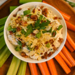 Keto Millionaire Dip served with raw carrots and celery sticks