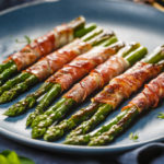 Keto bacon wrapped asparagus served in a bundle on a blue plate