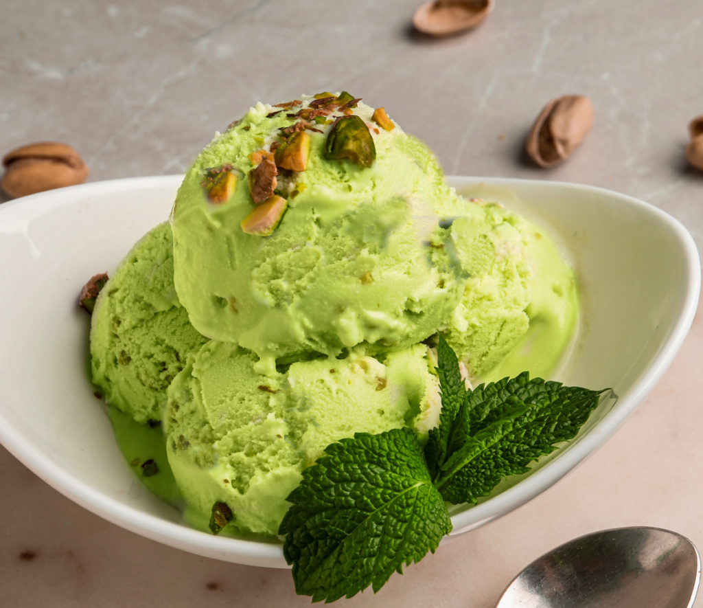 keto pistachio ice cream served in a white dish