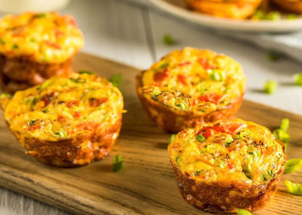 low-carb egg muffins served on a wooden board