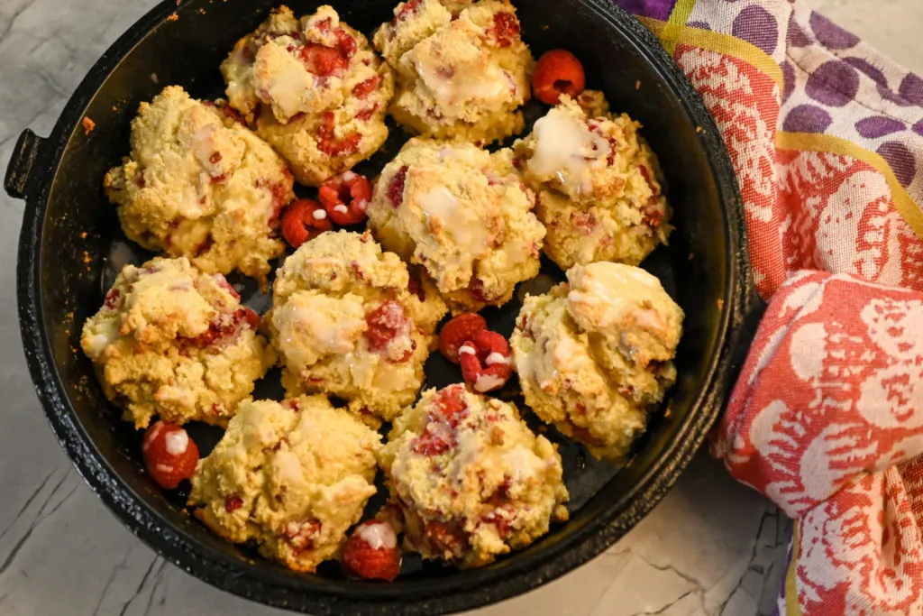 Keto raspberry biscuits baked in a cast-iron skillet