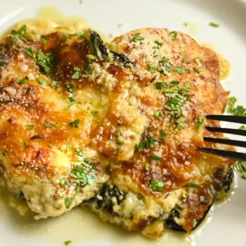 keto-friendly chicken Florentine casserole served on a white plate