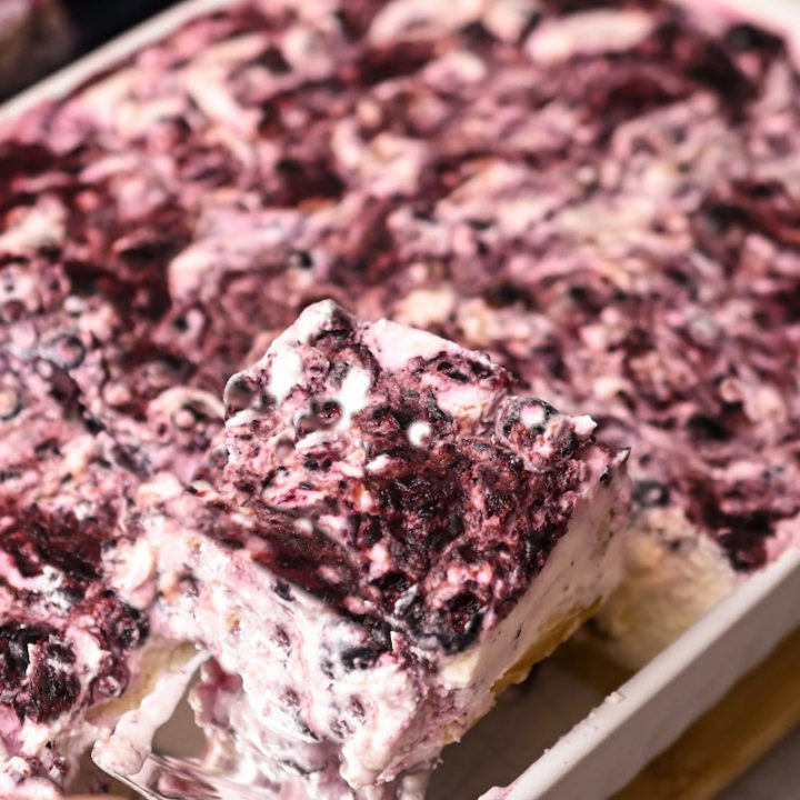 Easy keto no-bake blackberry cheesecake cut into squares