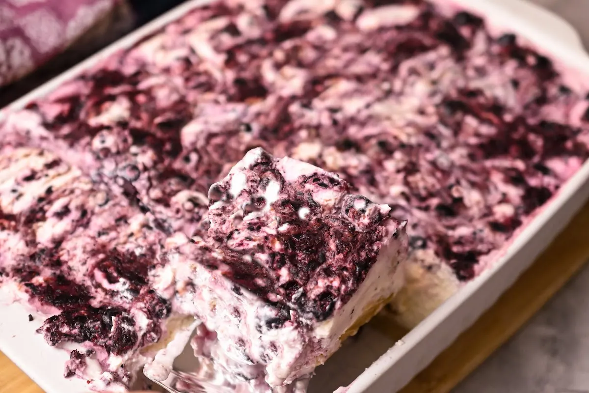 Easy keto no-bake blackberry cheesecake cut into squares